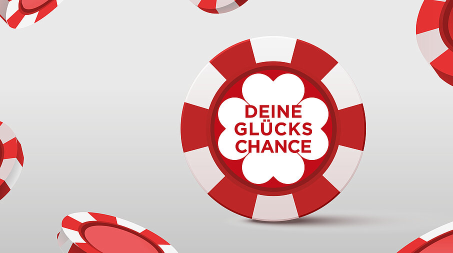 Glückschance Jeton auf grauem Hintergrund 